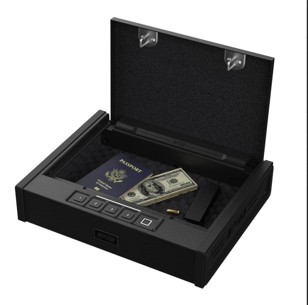 A black security box with a digital keypad, opened to reveal a passport, cash, and a small object inside, all resting on a textured black interior.